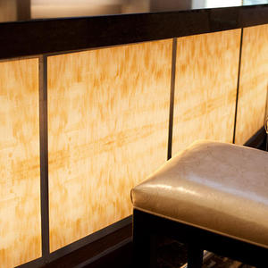 Bar front in backlit ViviStone Honey Onyx