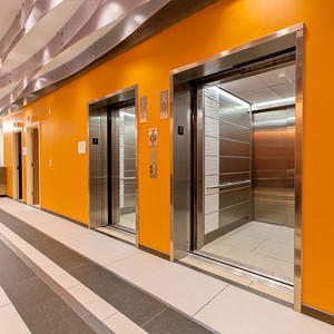 LEVELe-103 Elevator Interior with panels in Stainless Steel with Seastone finish