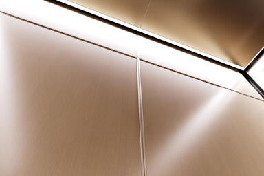 LEVELe-106 Elevator Interior with Capture panels in Champagne wood veneer
