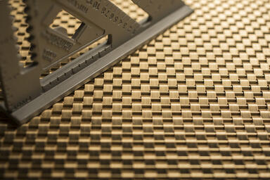 Linq Woven Metal shown with Wave CrossLinq pattern in Brass