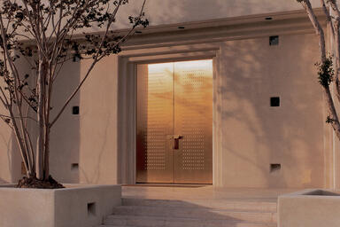 Fused Metal Doors in Fused Bronze with Sandstone finish and Circle Impression