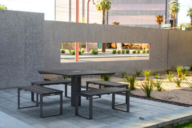 Apex Table Ensemble shown in four-bench configuration with Aubergine Texture