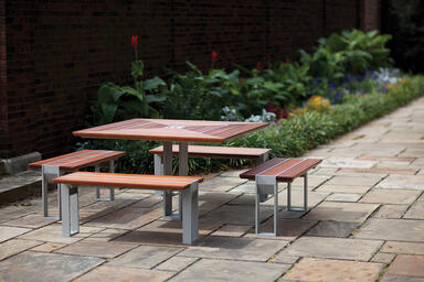 Apex Table Ensemble shown in four-bench configuration with FSC® 100% hardwood sl