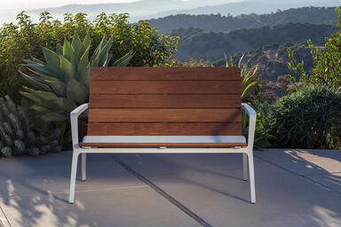 Vaya bench shown with White Texture powdercoated frame and FSC&reg; 100% Cumaru