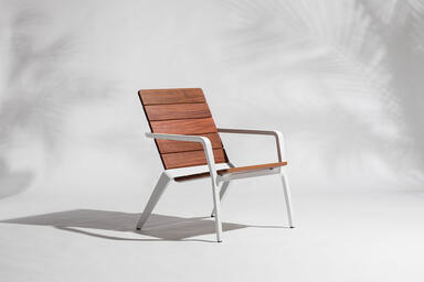 Vaya chair shown with White Texture powdercoated frame and FSC&reg; 100% Cumaru