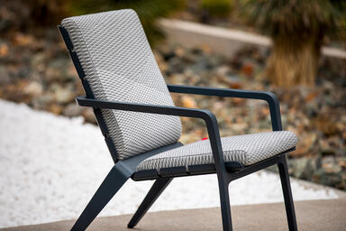 Vaya Textile Chair shown with Dark Grey Metallic Texture powdercoated frame 