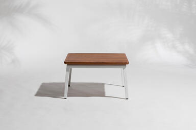 Vaya side table shown with White Texture powdercoated frame and FSC&reg; 100% Cumaru