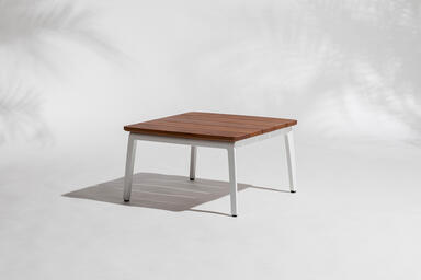 Vaya side table shown with White Texture powdercoated frame and FSC&reg; 100% Cumaru
