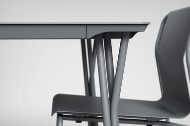 Factor Table shown with Cool Grey Texture powdercoated frame and aluminum table