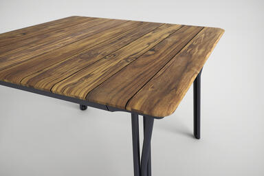 Factor Table shown with Ink Blue Texture powdercoated frame and FSC 100% Teak