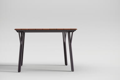 Factor Table shown with Aubergine Texture powdercoated frame and FSC 100% Teak