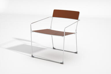 Linia Lounge Chair shown with Clay Texture powdercoated seat and back, and elect