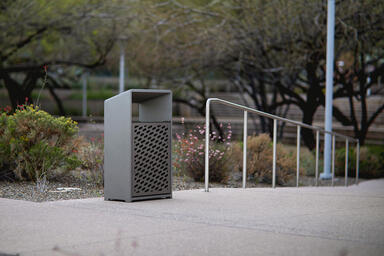 Bevel Litter Receptacle shown with perforated door and back in Slate Texture