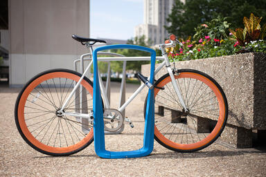 Twist Bike Racks shown with Azure and Aluminum Texture powdercoat