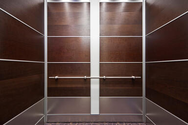 LEVELe-107A Elevator Interior; Capture panels in custom American Cherry 