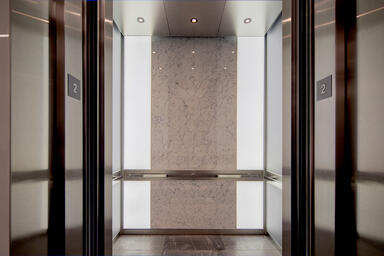 LEVELe-105 Elevator Interior with Capture panels in ViviChrome Chromis glass
