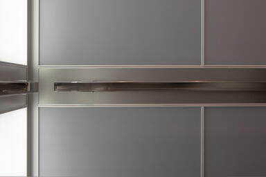 LEVELe-105 Elevator Interior with Capture panels in ViviChrome Chromis glass