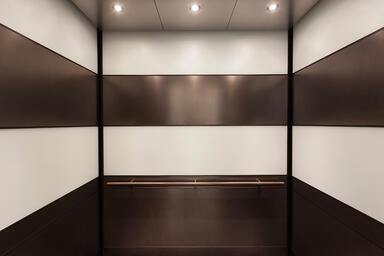 LEVELe-104 Elevator Interior with main panels in ViviChrome Chromis glass, White