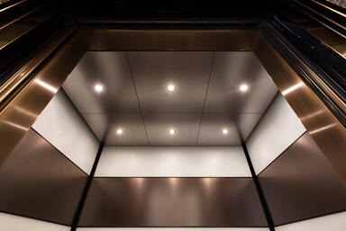 Elevator ceiling shown in Stainless Steel with Sandstone finish