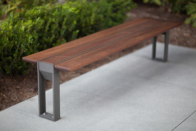 Apex Bench shown with Slate Texture powdercoated frame and FSC&reg; 100% Jatoba