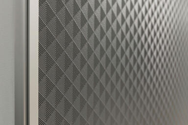 Wall panels in Bonded Aluminum with Natural Patina and Herringbone pattern 
