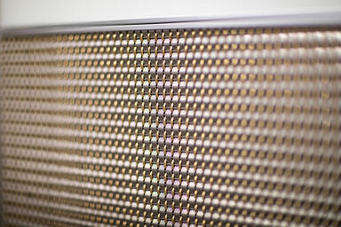 Linq Woven Metal with custom CrossLinq pattern in Stainless Steel and Brass