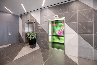 LEVELe-104 Elevator Interior with customized panel layout; LightPlane Panels in 
