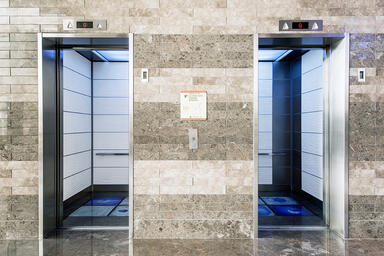 LEVELe-103 Elevator Interior with Capture panels in Bonded Quartz, White 
