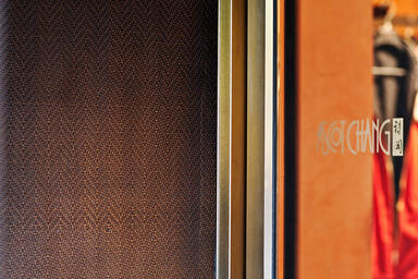 Wall panels in Bonded Bronze with Dark Patina and custom pattern