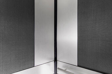 LEVELe-105 Elevator Interior with panels in Bonded Aluminum with Dark Patina 