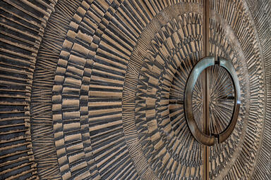 Doors shown in Bonded Bronze with Dark Patina and Corona pattern 