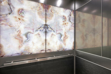 LEVELe-106 Elevator Interior with panels in ViviStone Cream Onyx glass with Pear