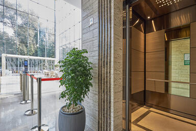 LEVEL-105 Elevator Interior with customized panel layout; Minimal panels