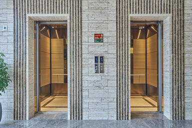 LEVEL-105 Elevator Interiors with customized panel layout; Minimal panels