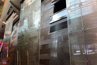 Water feature with CastGlass Profile Monolithic glass in custom texture at Aria