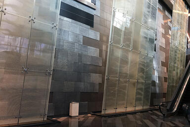 Water feature with CastGlass Profile Monolithic glass in custom texture at Aria