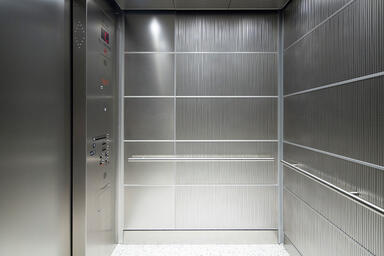 LEVELe-103 Elevator Interior with Capture panels in Stainless Steel