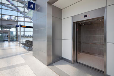 LEVELe-103 Elevator Interior with Capture panels in Stainless Steel, Seastone 