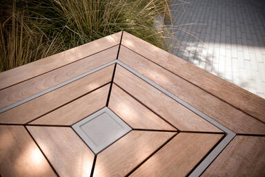 Apex Table: mitered slats and aluminum pinstripe detail, Antelope Valley College