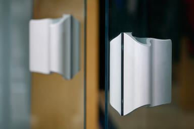 Wave Door Pulls shown in Clear Matte Aluminum 