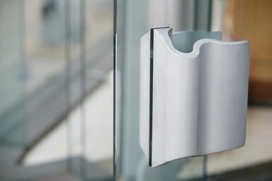 Wave Door Pulls shown in Clear Matte Aluminum 