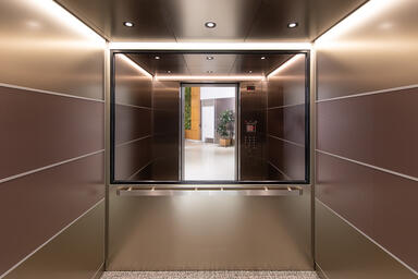 LEVELe-104 Elevator Interior with customized panel layout; Capture panels
