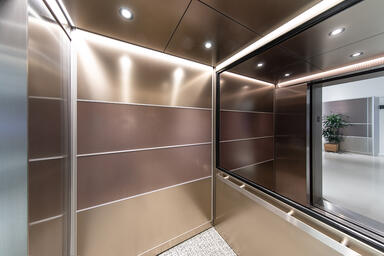 LEVELe-104 Elevator Interior with customized panel layout; Capture panels