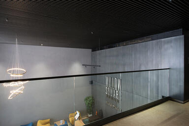 Wall panels in Bonded Aluminum with Dark Patina and Loft pattern at Baashyaam
