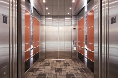 LEVELe-107A Elevator Interior; LightPlane Panels in ViviSpectra Spectrum glass 