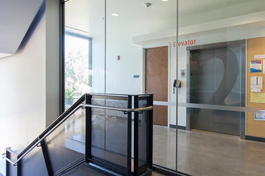 Stainless Steel Elevator Doors in Satin finish with custom Eco-Etch pattern 