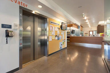 Stainless Steel Elevator Doors in Satin finish with custom Eco-Etch pattern