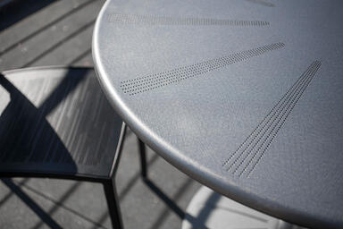 Detail of Citrus Table with Stainless Steel top in Diamond finish