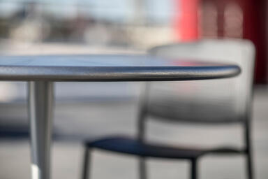 Detail of Citrus Table with Stainless Steel top in Diamond finish