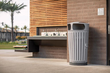 Dispatch Litter & Recycling Receptacle shown in split-stream configuration with 